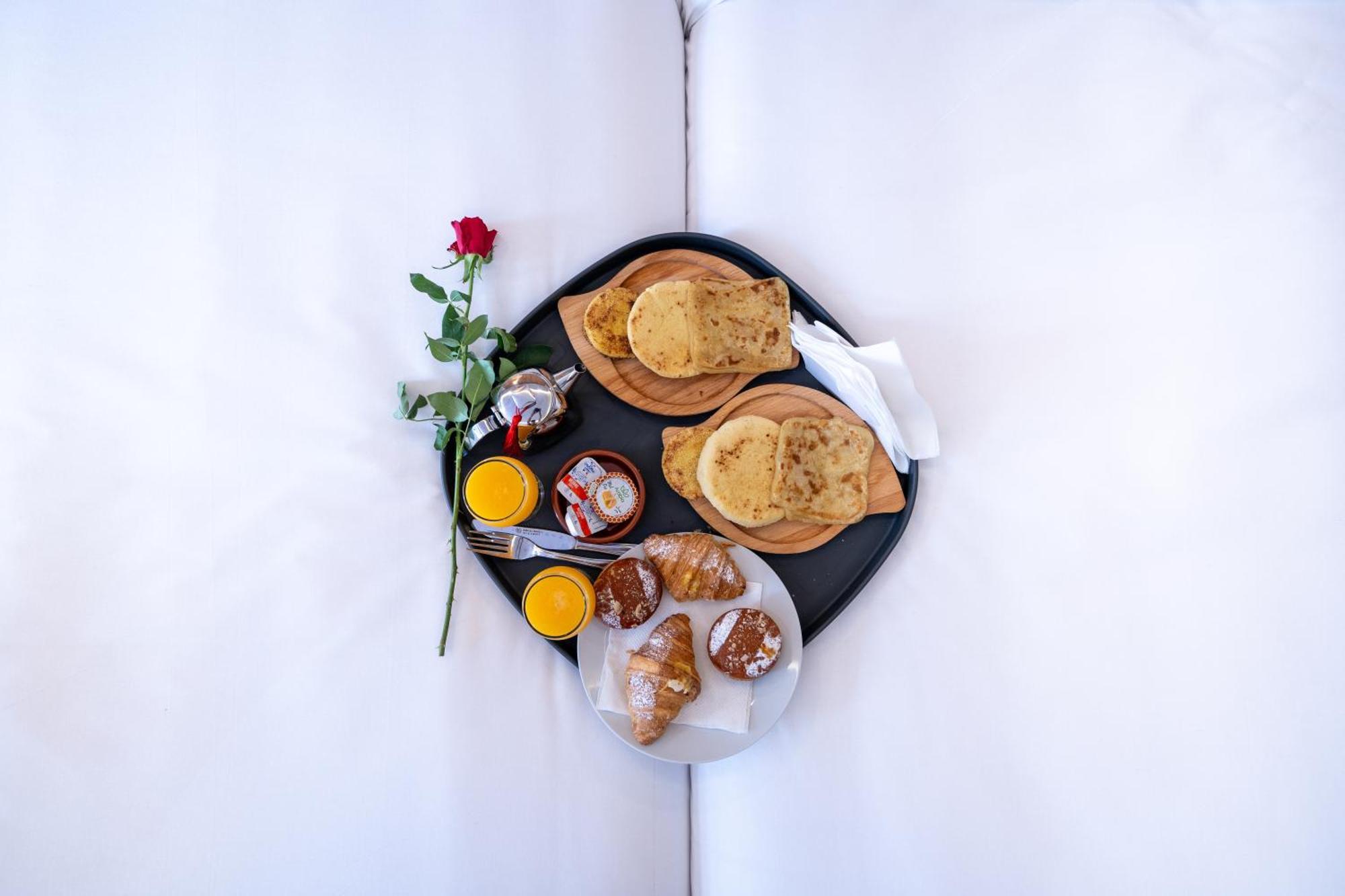 Unico Hotel Maarif 卡萨布兰卡 外观 照片